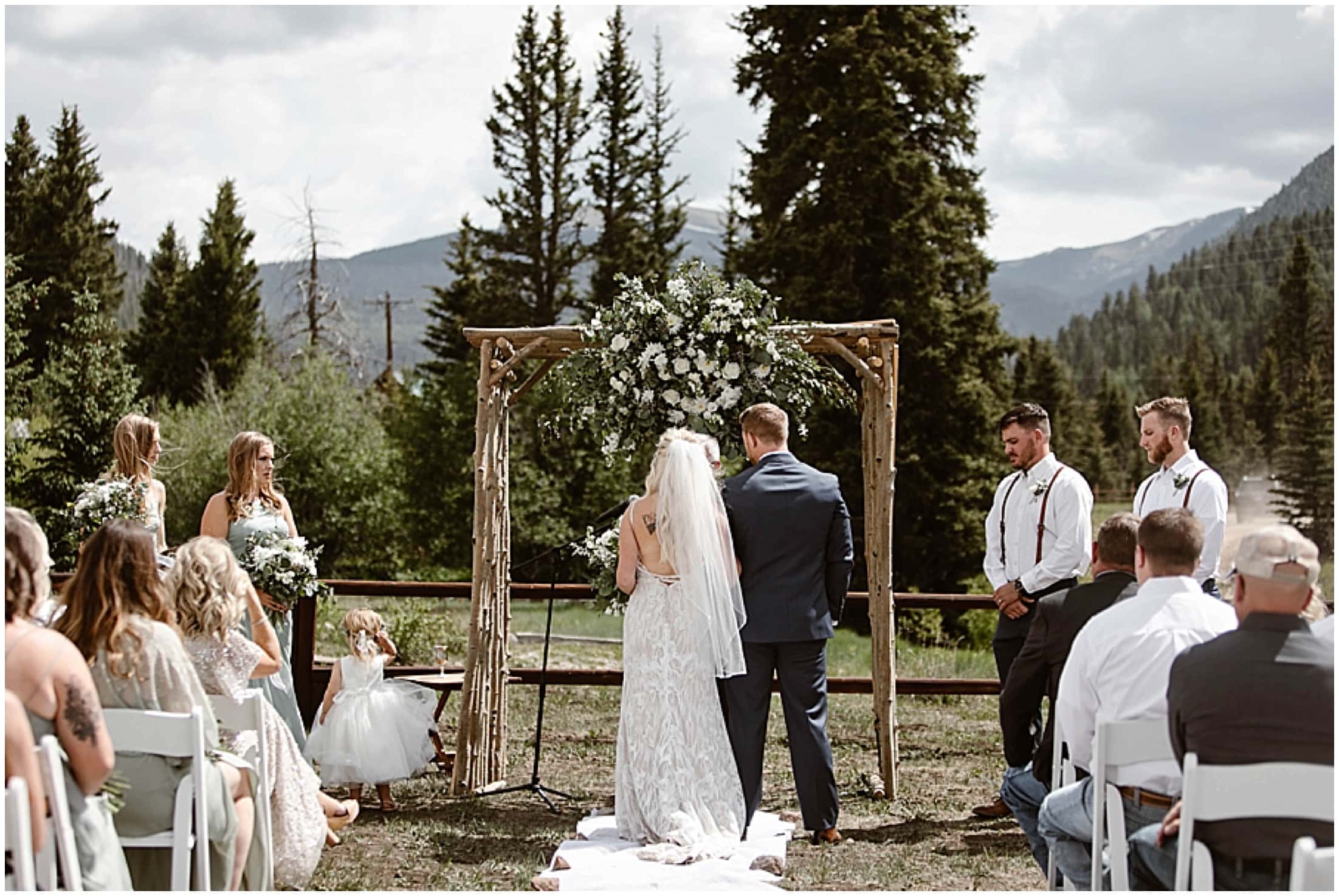 bride and groom private small wedding ceremony in the mountains of red river new mexico
